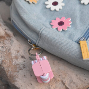 Pink Portable Hair Tie Holder on Backpack